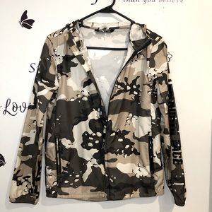 It’s a Northface windbreaker jacket, army print